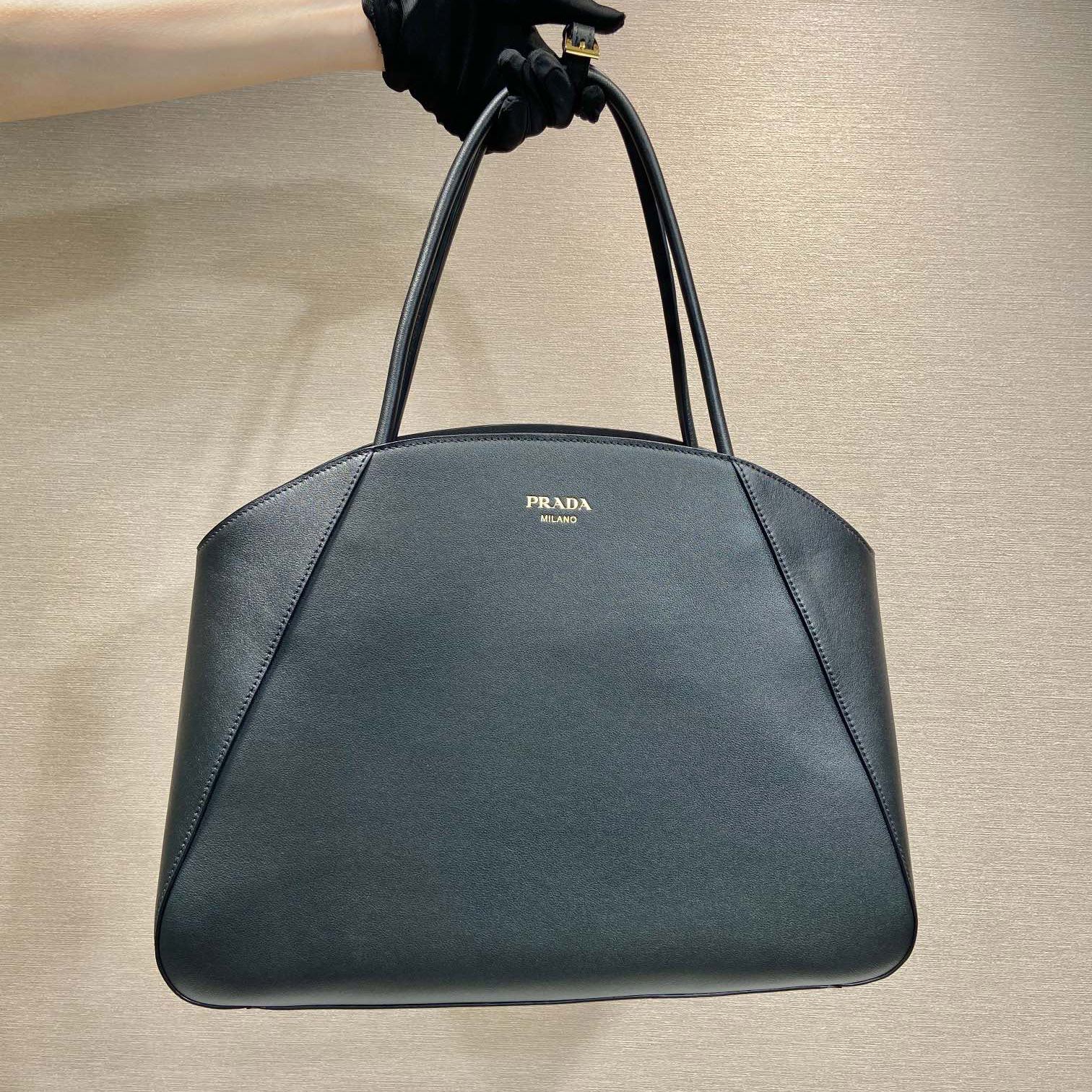 Pra*a top handle bags